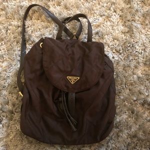 Adorable brown Prada bag.